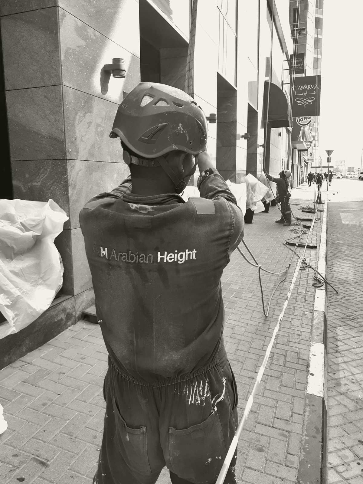 Arabian Height technician in branded uniform on site